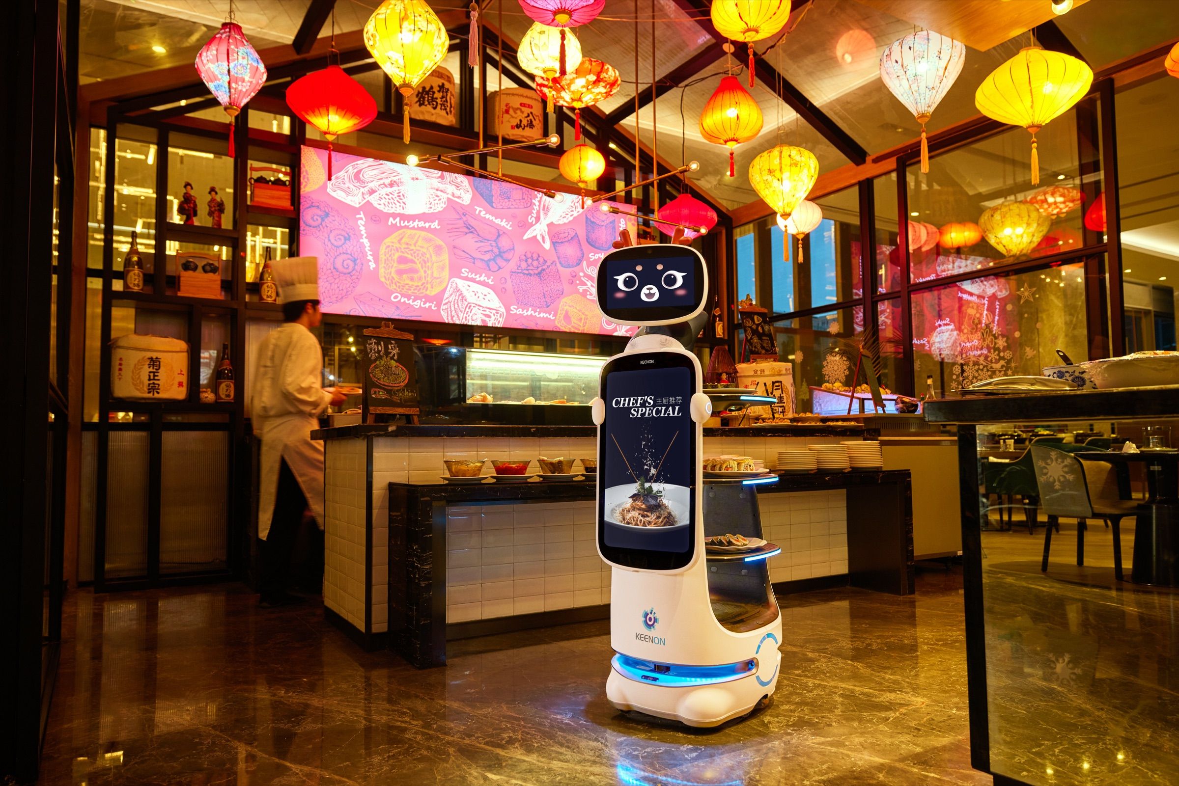 Service robot with a promotional display screen beside a restaurant buffet